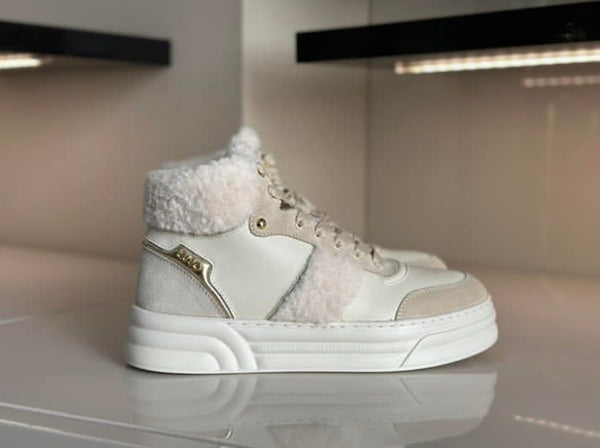 572923  Liu joSneakers montantes en cuir aspect chaud en fausse fourrure.