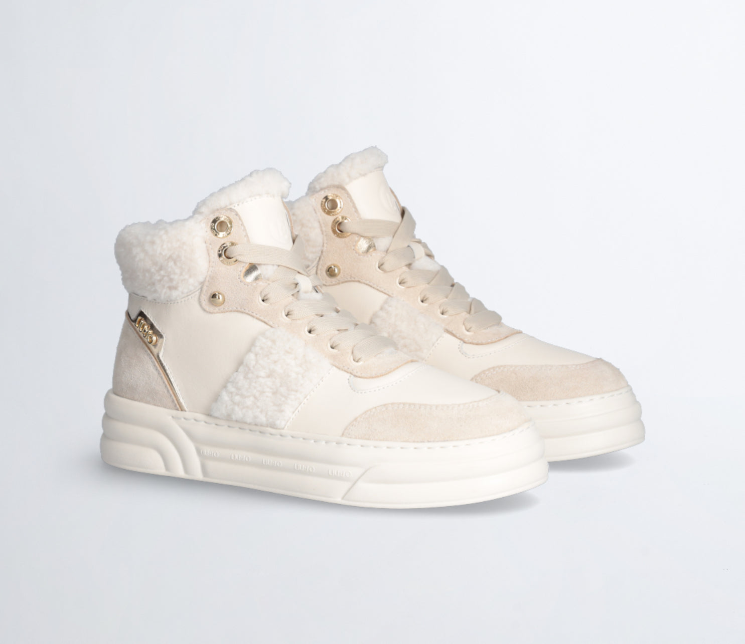 572923  Liu joSneakers montantes en cuir aspect chaud en fausse fourrure.