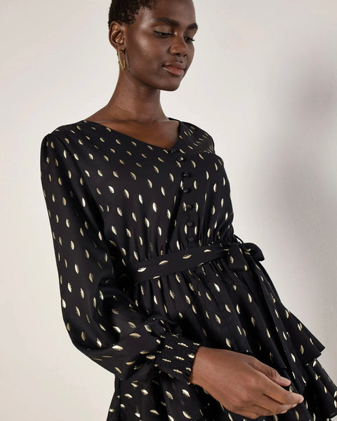 396925 Apricot robe noire à pastilles dorées